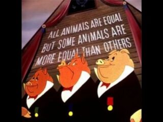 Three pigs dressed in human clothes standing in front of a sign 'All animals are equal but some animals are more equal than others'